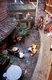 China: Family life in the inner courtyard at Zhenchang Lou Hakka Tower near Hukeng, Yongding County, Fujian Province